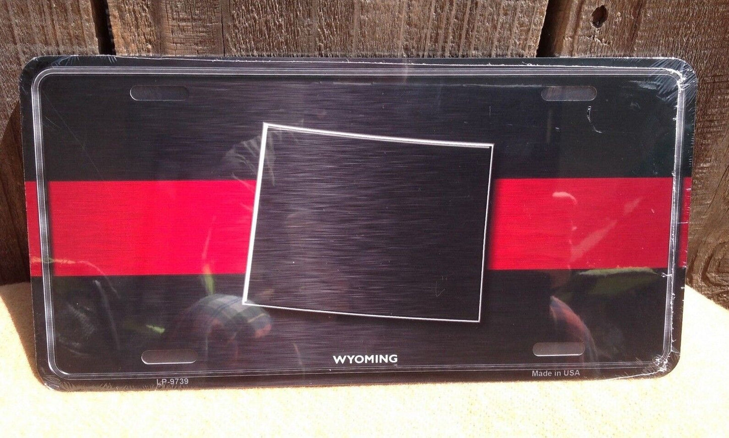 Wyoming Thin Red LIne Fire Fighter Man Department Novelty License Plate