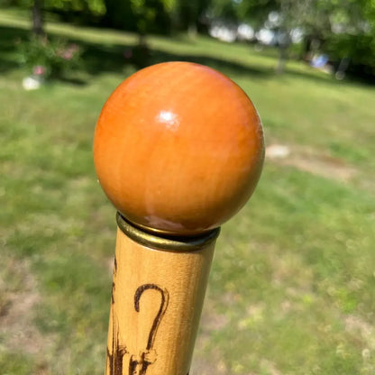 Polished wood ball handle with brass collar on handcrafted Jesus shepherd walking cane — heirloom detail